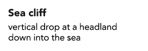 Sea cliff vertical drop at a headland down into the sea 